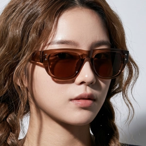 Classic oversized square sunglasses with brown translucent frames and silver rivets
