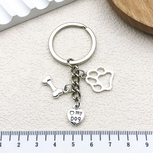 Silver dog bone and paw print keychain with a heart-shaped my Dog engraved charm