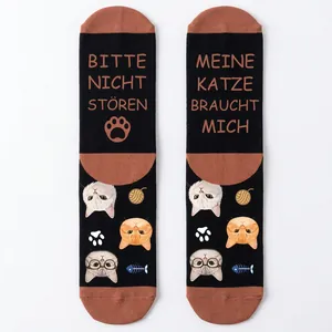 Funny cat pattern mid-calf socks with German text and colorful cartoon feline illustrations