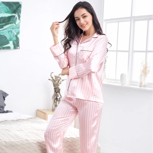 Women's pink and white striped satin pajama set with long sleeves and black piping detail