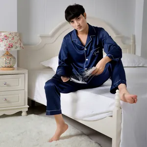 Navy blue men's satin pajama set featuring white piping and elegant chest embroidery