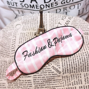 Pink and white striped silk sleep eye mask with Fashion & Pajamas embroidery text