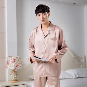 Detailed view of men's satin pajama set featuring classic lapel collar and contrast piping
