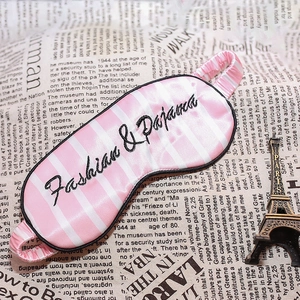 Pink and white striped silk sleeping eye mask with Fashion & Pajama black embroidery