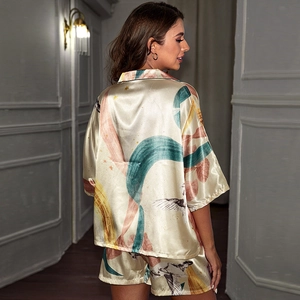 Silk satin pajamas set for women with artistic bird print and relaxed shorts