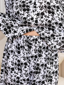 Detail of elastic waistband and buttons on breathable printed rayon pajama set