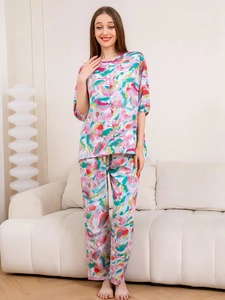 Detail of colorful abstract oil paint print on soft rayon two-piece pajama set