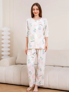 Detail view of floral rayon pajama set for women featuring blue flowers and buttons