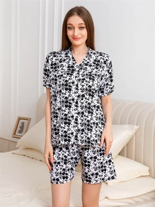 Close-up of lightweight floral pajama set with short sleeves and button-down collar