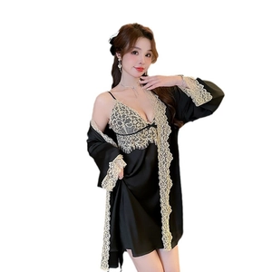 Elegant black silk satin pajama set for women with delicate gold lace trim details