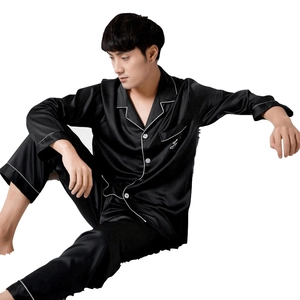 Men's luxury black satin pajama set with long sleeves, pants and white contrast piping