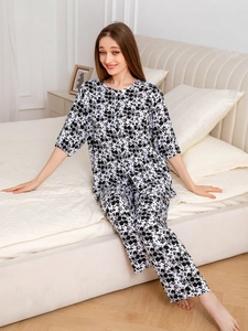 Detail of floral print pajama set with comfortable short sleeves and matching trousers