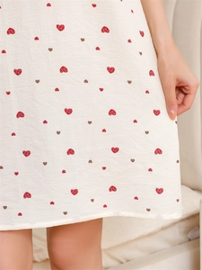 Detail shot of waffle fabric texture with cute heart prints on summer loungewear
