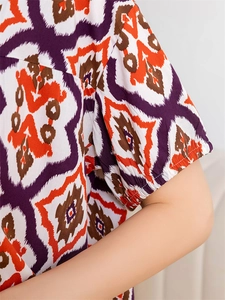 Macro detail of geometric floral print and elastic puffed sleeve on summer pajama top