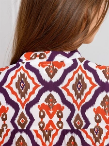 Macro detail of Bohemian geometric print on lightweight viscose summer pajama top