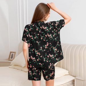 Women's black V-neck pajama set with red rose print in short sleeve and shorts