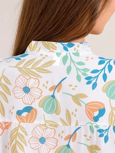 Close-up of vibrant floral print and fabric texture on back of women's viscose pajama top