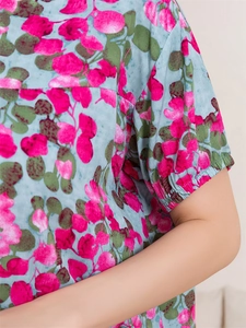 Detail of elastic cuff and pink leaf print on soft summer floral pajama top for women