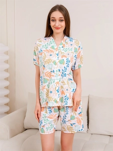 Close-up of women's V-neck floral pajamas set featuring breathable fabric and shorts