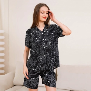 Women's V-neck floral pajamas set with short sleeves and matching shorts in black and white