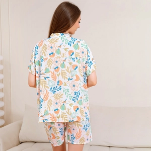 Women's summer rayon pajama set featuring v-neck floral short sleeve top and shorts