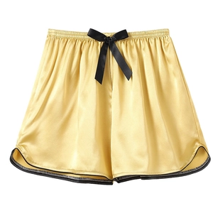 Champagne gold ice silk sleep shorts with black bow tie and elegant satin finish