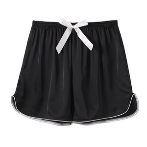 Women's black ice silk pajama shorts with white satin bow and contrast piping trim