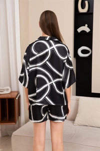 Vue arrière de l'ensemble pyjama pour femme avec motif géométrique noir et blanc