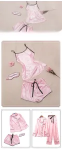 Pink striped satin 7-piece pajama set including top, pants, eye mask and hair tie