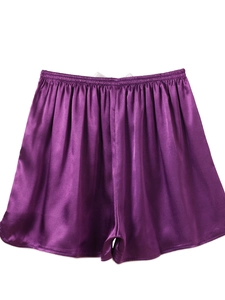 Detailed view of dark purple ice silk satin shorts with elastic waistband and smooth texture