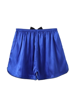 Detail of royal blue ice silk sleep shorts with elastic waist and black bow decor