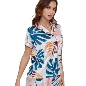 Women's two-piece ice silk pajamas set with tropical leaf print and short sleeves
