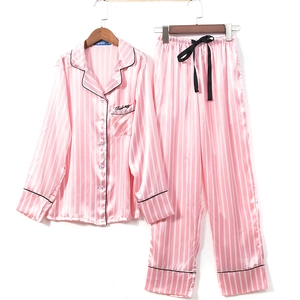 Pink striped satin pajama set for women with long sleeves and elegant button-down design