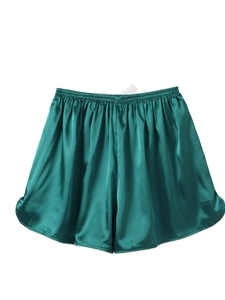 Detailed view of dark green ice silk sleep shorts with elastic waistband and satin finish
