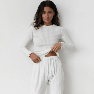White heart pointelle knit pajama set with long sleeves and lettuce edge details