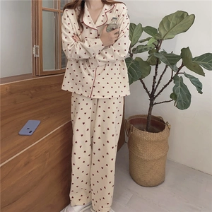 Women's cream pajama set with red heart print and long sleeves for autumn comfort
