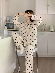 Detail view of cotton gauze pajama set with heart print and notched collar style