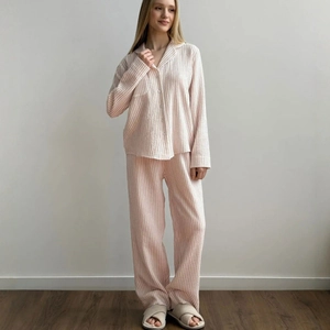 Women's pink striped cotton pajama set with long sleeves and button-down shirt