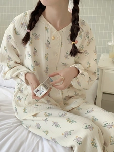Close-up of quilted floral pajamas showing warm texture and ribbed cuffs for winter