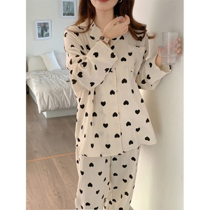 Women's cotton pajama set with black heart print and long sleeves in cream beige