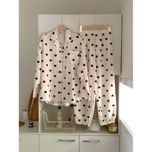 Cozy cotton gauze pajama set for women with black heart prints in soft off-white