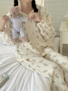 Detail of floral air cotton pajamas with lace neckline and waffle texture detail