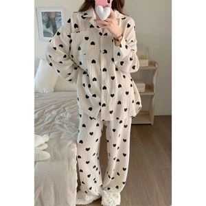 Women's cream cotton gauze pajama set with black heart prints and button-down top