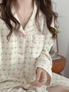Close-up of quilted floral pajamas showing the soft pink edging and wave pattern detail