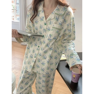 Women's cotton floral pajama set with long sleeves and green checkered trim detail