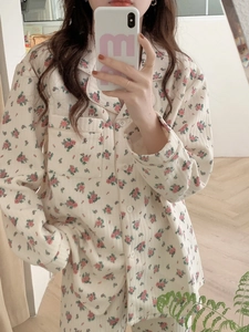 Close-up of floral pattern and button closure on women's thermal cotton pajamas