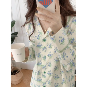 Women's floral cotton pajama set with green buttons and plaid piping detail