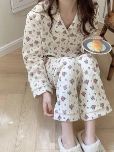 Close-up of thermal floral pajamas with vertical jacquard texture and button-up detail