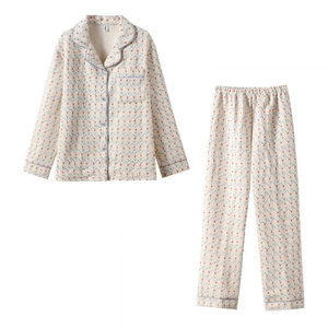 Floral quilted pajama set for women with long sleeves and pants in cream white color