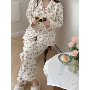 Floral thermal pajama set for women with long-sleeved button-down top and matching pants